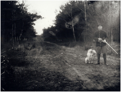 Het jagen door J. van Gils met zijn hond